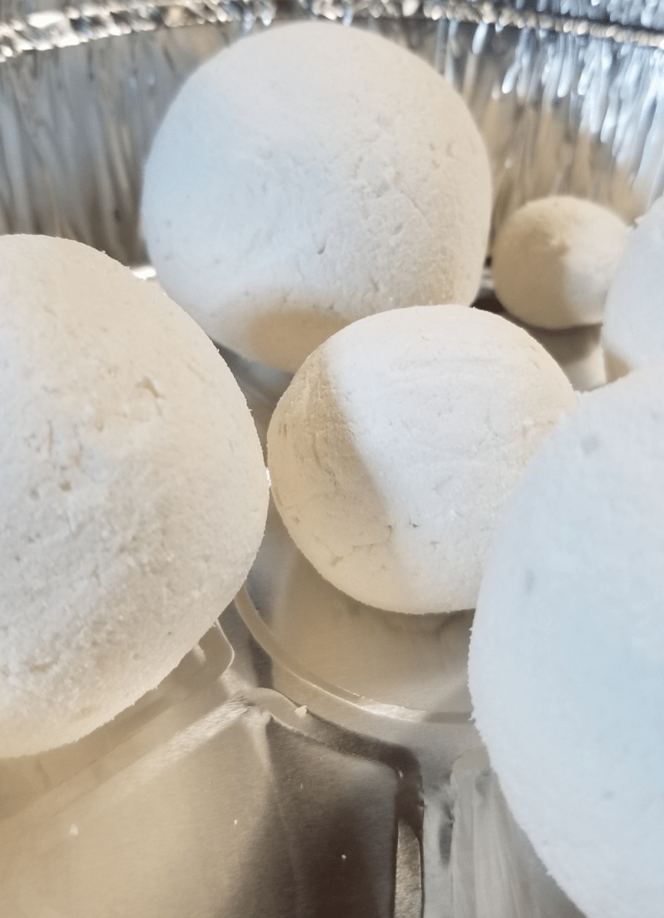 Photograph of incredibly beautiful white wash balls.