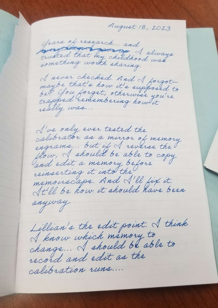 Photograph of a saddle-stitched journal with cursive "handwriting".